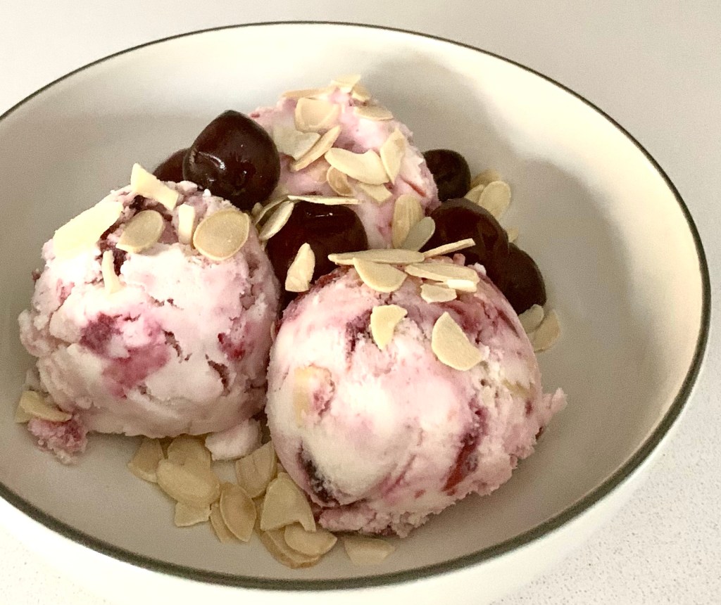 Cherry bakewell Keto ice cream with toasted almonds and cherries